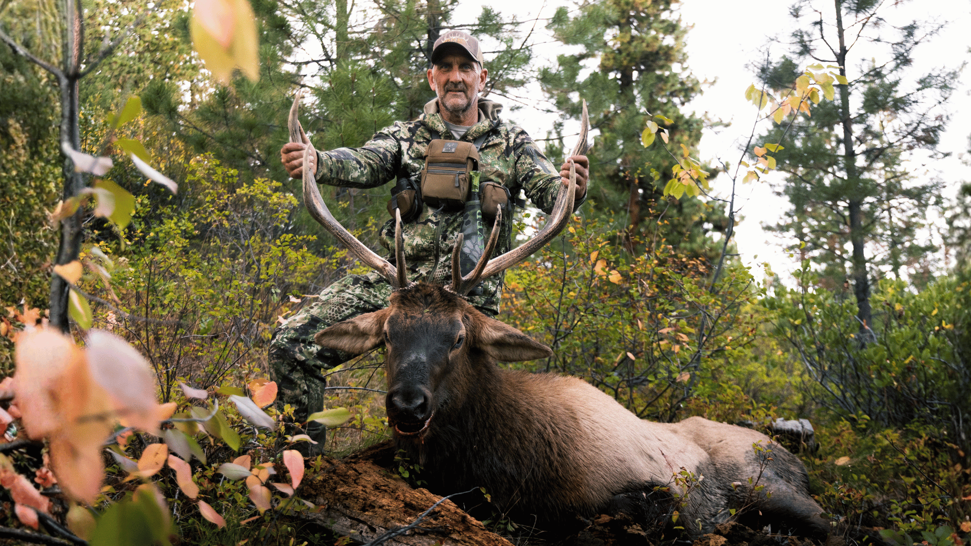 Slayer call builder and archery elk hunter, Joe McCarthy posing with harvested bull elk.