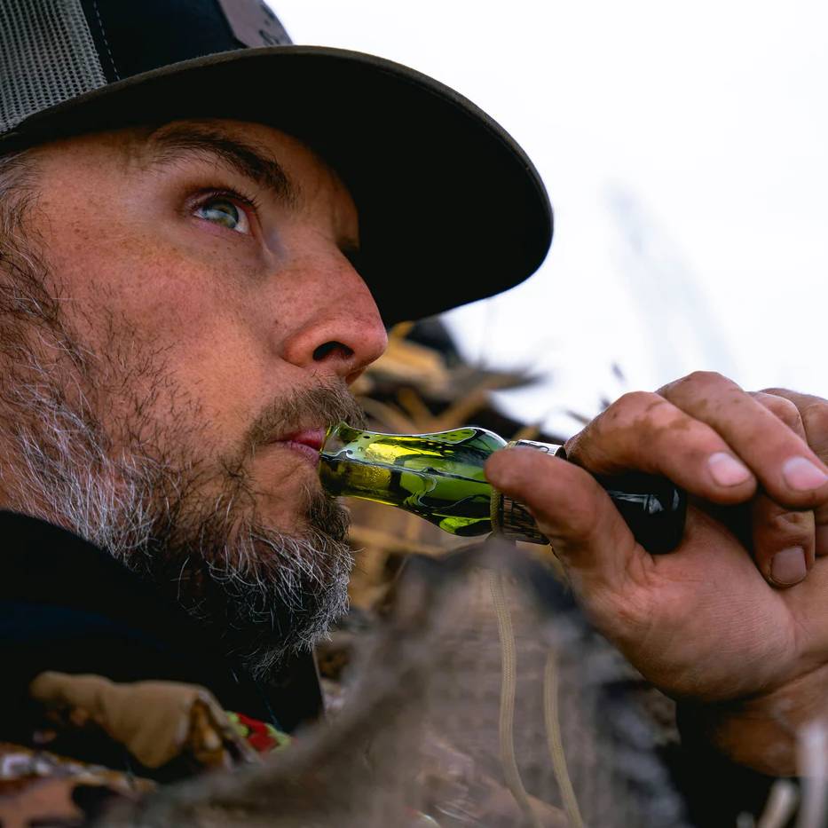 Hunter using duck call