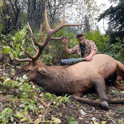 Hunter with elk