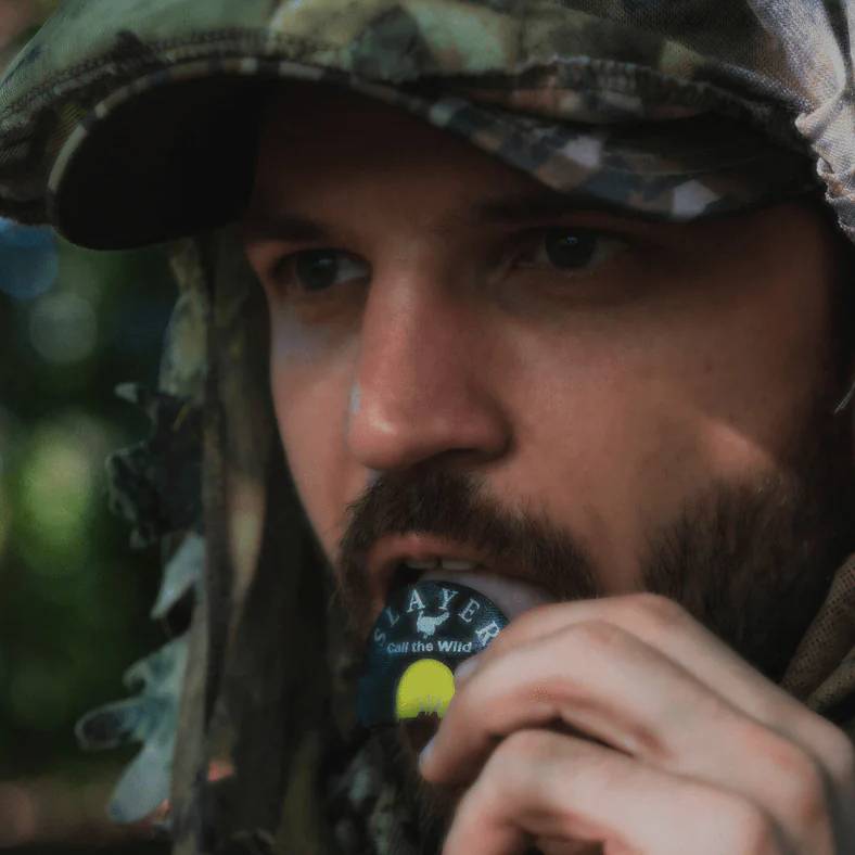 Hunter using turkey call