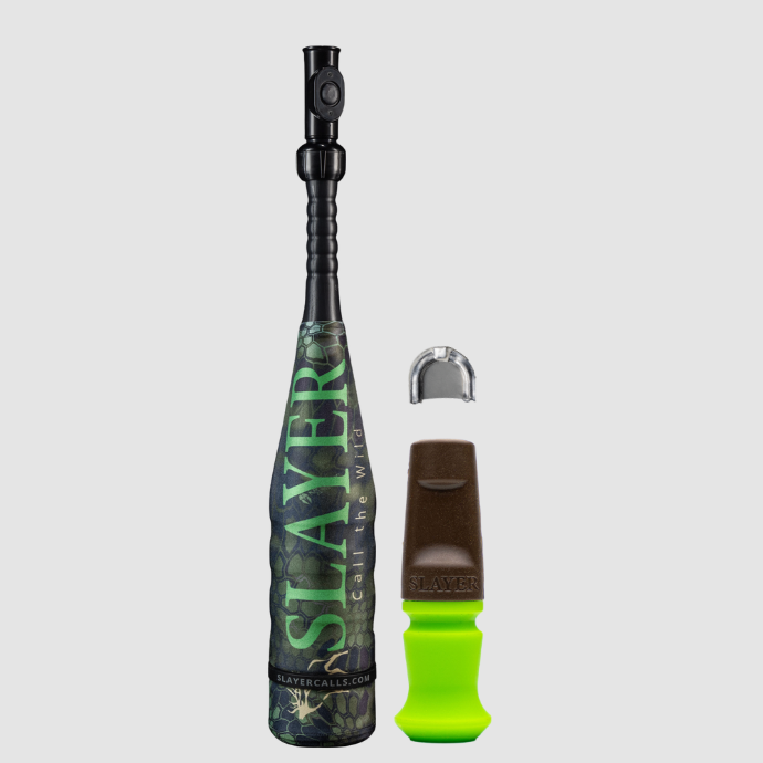 Slayer Enchantress push button cow call attached to the Swagger bugle tube with camo sleeve, shown with the Harem brown and green bite call and extra Enchantress reed.