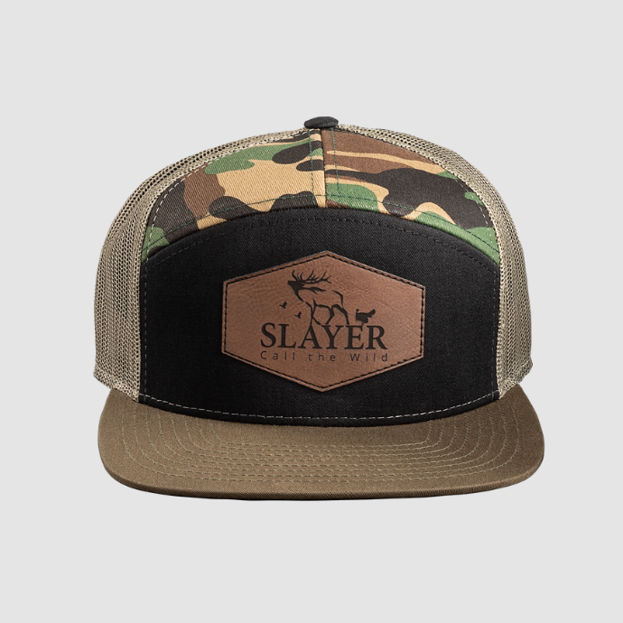 Slayer Calls camo trucker hat with leather patch logo — mesh-back design with green camo and flat bill