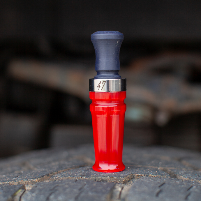 Slayer Calls' Trump 47 Yolo Bypass duck call in MAGA red acrylic with silver band engraved with American flag and numbers 45 and 47, featuring straight-frame design for cutdown-style sound.