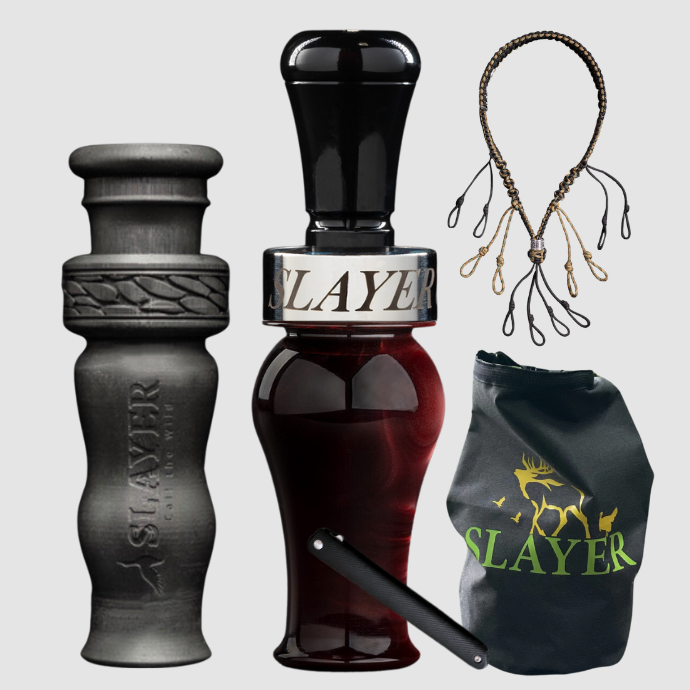 Slayer Calls duck call and duck whistle bundle with Slayer's Ranger duck call in red, 4-in-1 duck whistle, lanyard, field dressing tool, and dry bag featuring SLAYER logo.