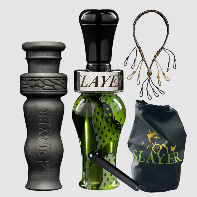 Slayer Calls duck call and duck whistle bundle with Slayer's Ranger duck call in green, 4-in-1 duck whistle, lanyard, field dressing tool, and dry bag featuring SLAYER logo.