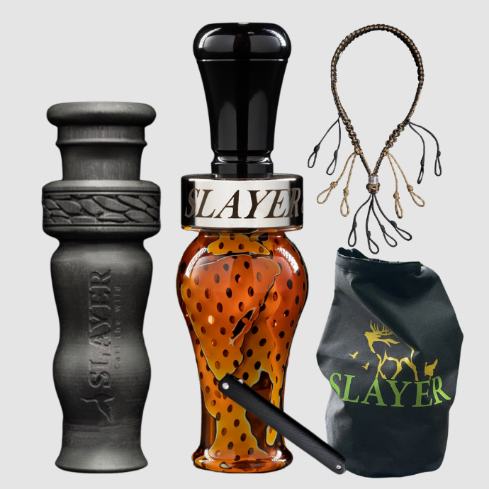 Slayer Calls duck call and duck whistle bundle with Slayer's single reed Ranger duck call in orange, 4-in-1 duck whistle, lanyard, field dressing tool, and dry bag featuring SLAYER logo.