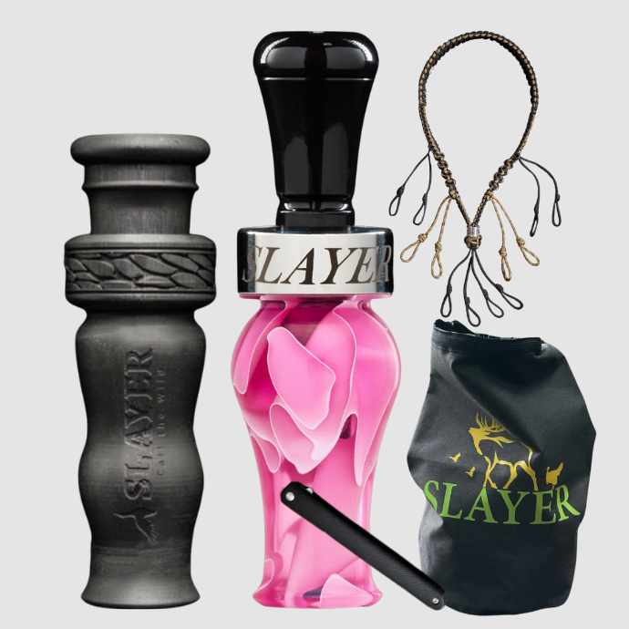 Slayer Calls duck call and duck whistle bundle with Slayer's single reed Ranger duck call in pink, 4-in-1 duck whistle, lanyard, field dressing tool, and dry bag featuring SLAYER logo.