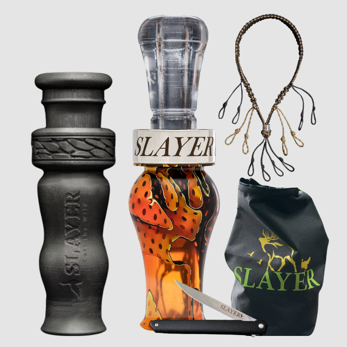 Complete Slayer waterfowl calling bundle featuring the black Drake Slayer duck whistle, acrylic duck call in Orange acrylic, premium paracord lanyard, dry bag, and field dresser. Tried & True Duck Hunting Collection - Slayer Duck Calls