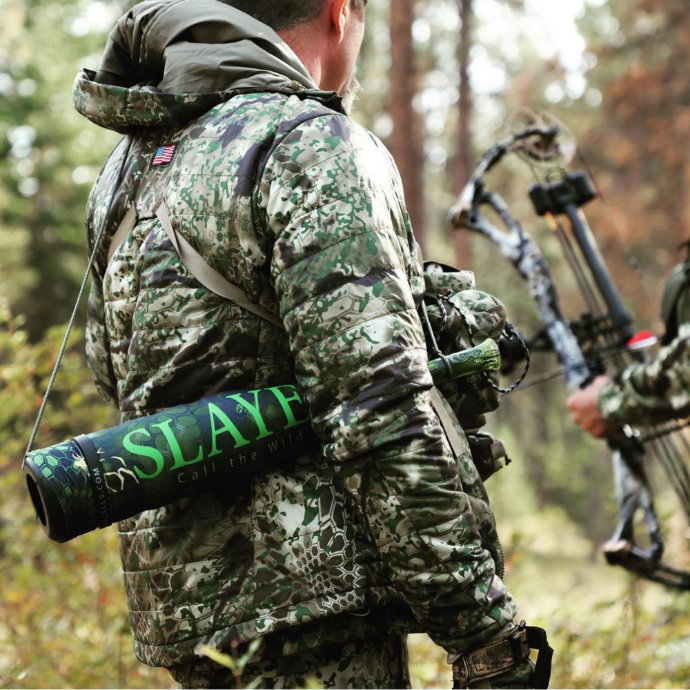 Elk hunter holding the ArchAngel bugle tube featuring Kryptek's Altitude camo sleeve
