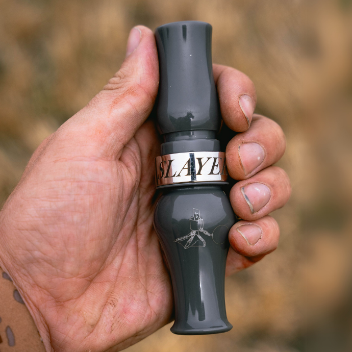 Flat Iron Goose Call by Slayer Calls, shown in flat grey with custom barrel engraving — precision-tuned for realistic Canada goose sounds during waterfowl hunts.