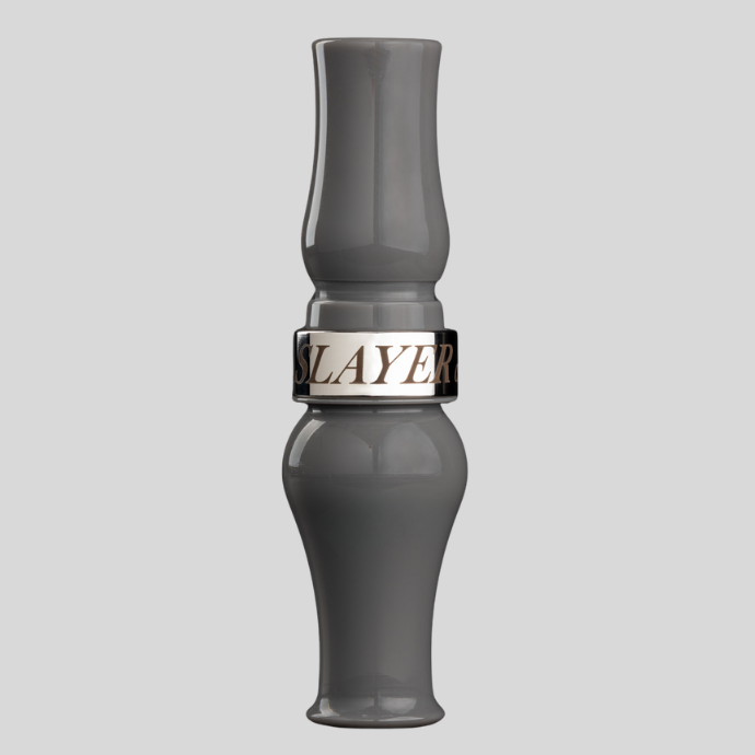 A polished grey goose call with a metallic silver band around the middle featuring the brand name 'SLAYER' in gold lettering, set against a solid light gray background.