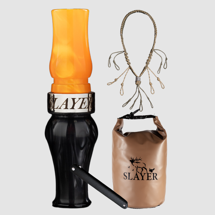 Slayer Calls goose hunting bundle including an acrylic goose call in black and orange, braided call lanyard, brown dry bag with SLAYER logo, and a dressing tool.