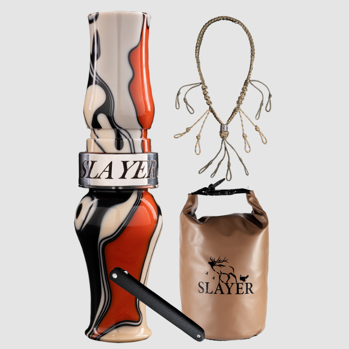 Slayer Calls goose hunting bundle including an acrylic goose call in red, black and white camo, braided call lanyard, black dry bag with green and yellow SLAYER logo, and a dressing tool.