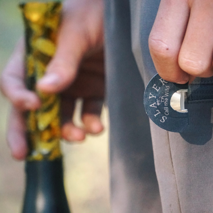 Close-up of elk hunter using the navy blue Lochsa Elk Reed from the Clearwater Diaphragm Series and ArchAngel bugle tube.