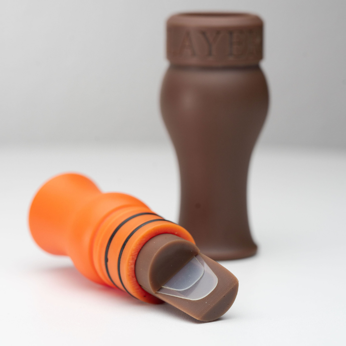 orange and brown speck call insert on white background