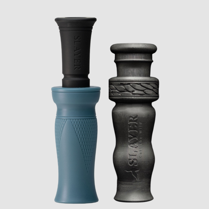 Slayer blue and black duck call and a black duck whistle on a light gray background.