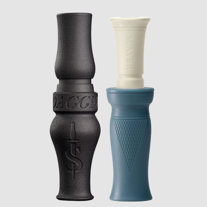 Two waterfowl calls, one black goose call and one blue duck call, on a light gray background.