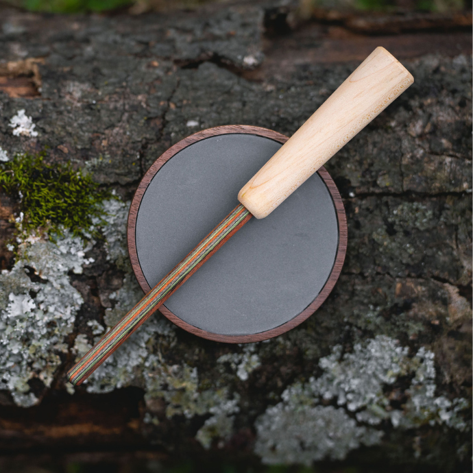 Slayer's Seductive Hen Slate Pot Call with composite striker, designed for realistic turkey sounds in the field.