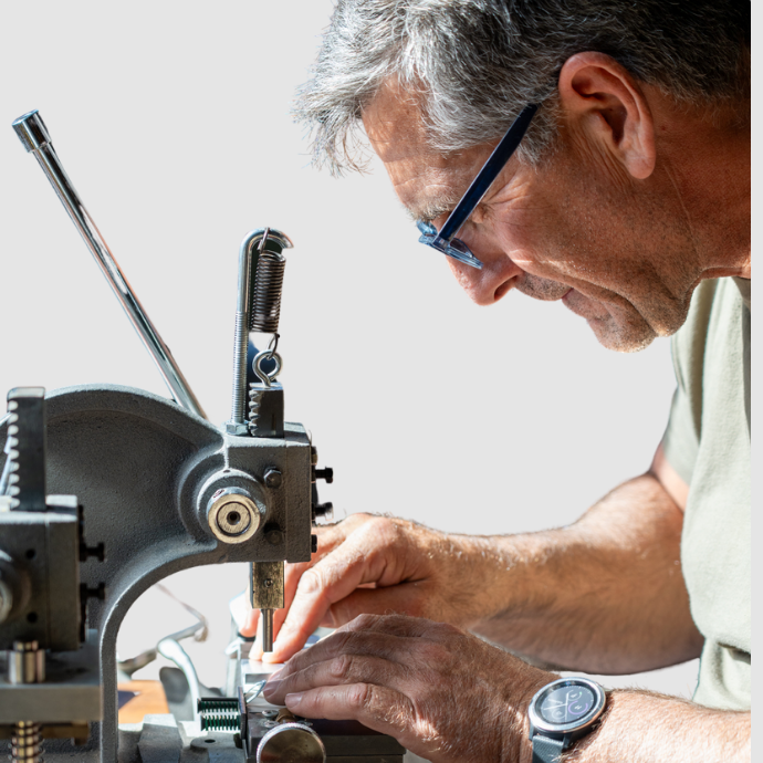 Joe McCarthy, Head of Product Innovation makes elk reeds and tests quality