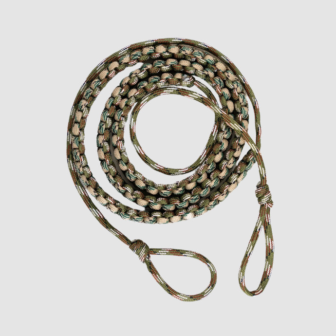 Slayer Calls paracord strap designed for bugle tubes — rugged, camo-colored braided cord with adjustable loops for secure, hands-free elk calling in the backcountry.