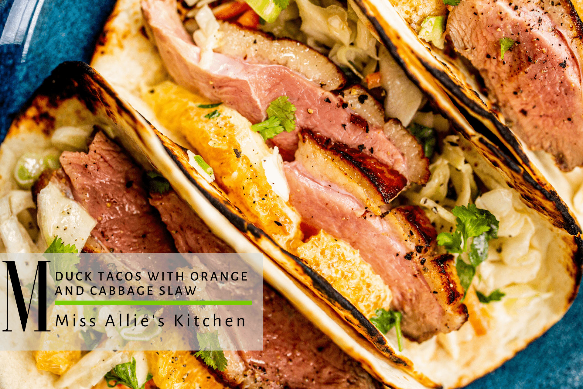Duck tacos with orange & cabbage slaw