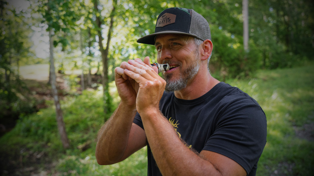 Waterfowl hunter blowing the Crackerjack Goose Call by Slayer Calls for Slayer Calls' instructional series, Call the Wild.