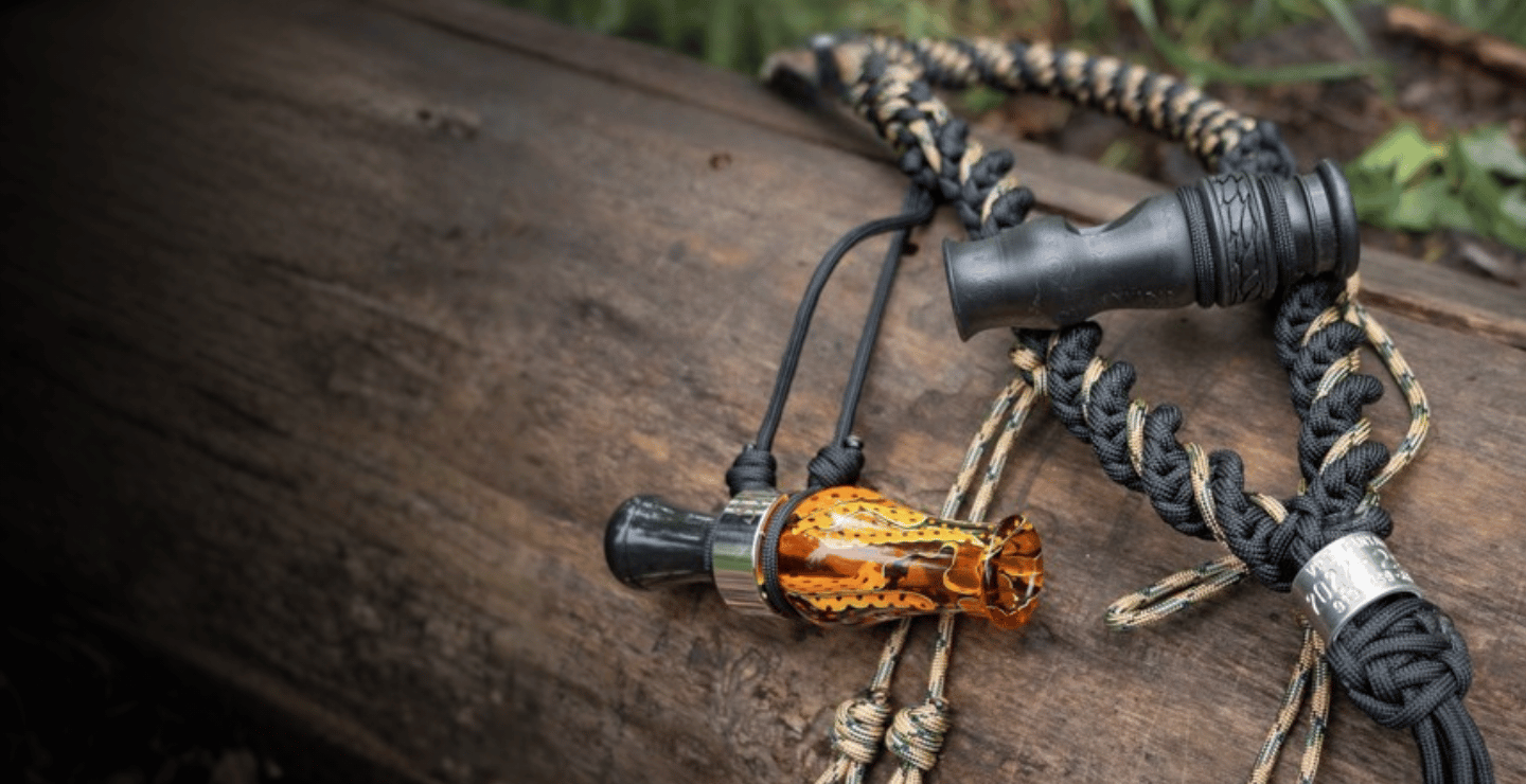 Duck hunter in the field running Slayer's 4-in-1 duck whistle. Multiple duck sounds from one whistle.