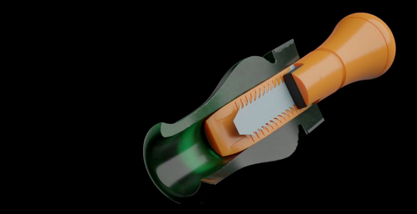 The DUBAR duck call in green and orange, cut in half to show the unique reed and soundboard—raspy and ducky.