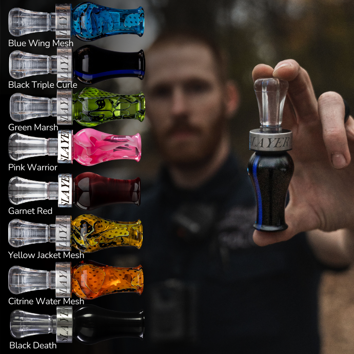 Hunter blowing the drake slayer single reed duck call in black death color