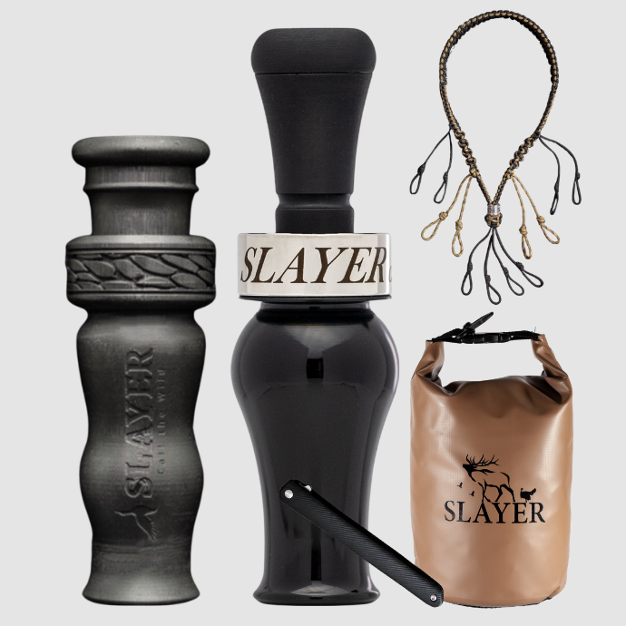 Slayer Calls duck call and duck whistle collection with Slayer's DUBAR Slayer duck call in jet black acrylic, 4-in-1 duck whistle, lanyard, field dressing tool, and dry bag featuring SLAYER logo. 