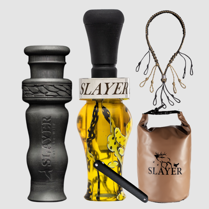 Slayer Calls duck call and duck whistle collection with Slayer's DUBAR Slayer duck call in yellow acrylic 4-in-1 duck whistle, lanyard, field dressing tool, and dry bag featuring SLAYER logo. 