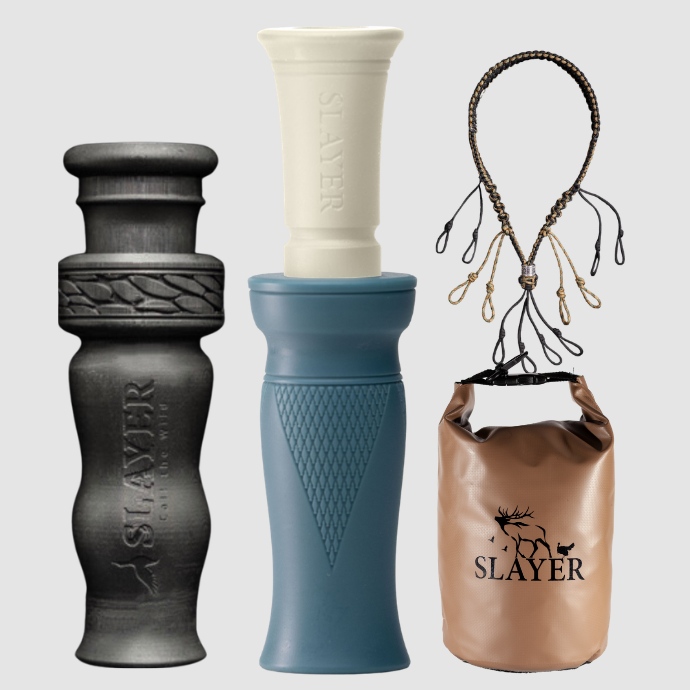 Slayer duck call, whistle, dry bag and lanyard with 'Slayer' branding on a light gray background