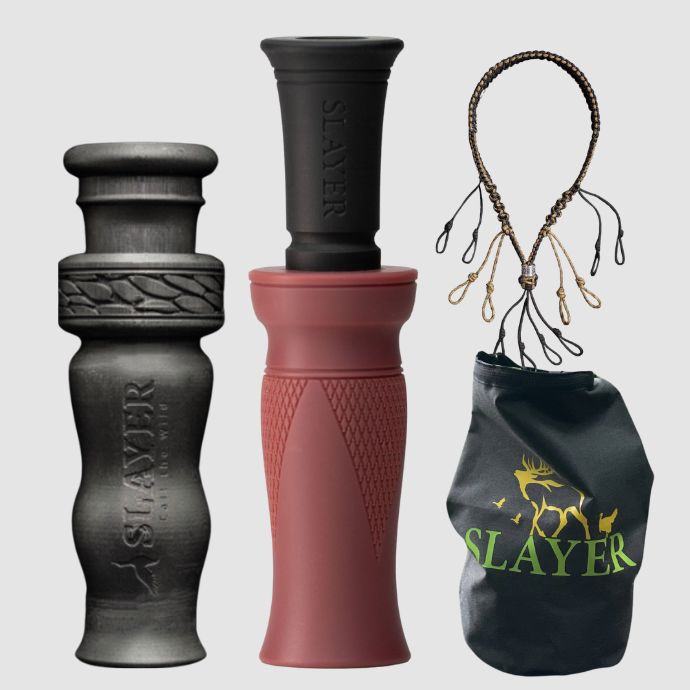 Slayer red dirt duck call, whistle, dry bag and lanyard with 'Slayer' branding on a light gray background