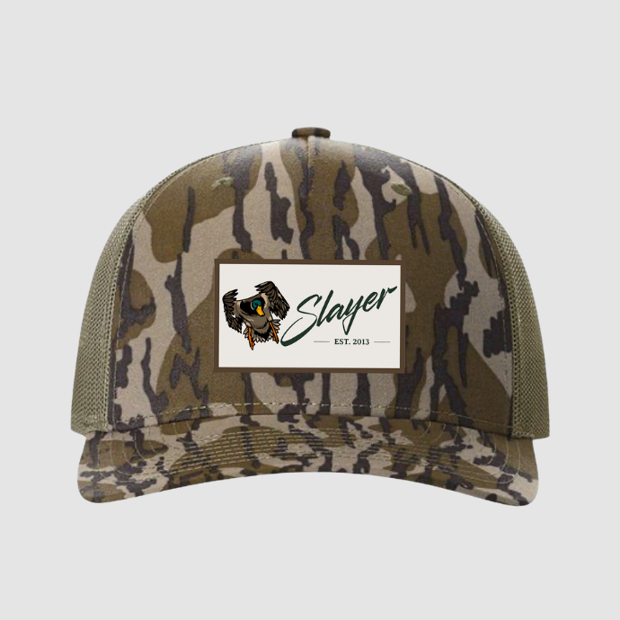 bottomland camo trucker hat with embroidery patch with a mallard and Slayer branding
