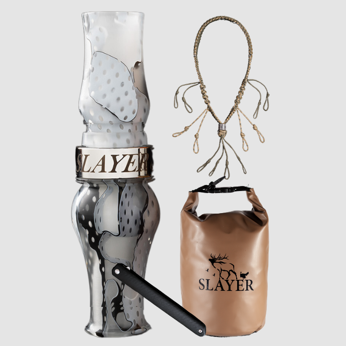 Slayer Calls goose hunting bundle including an acrylic goose call in snow mesh, braided call lanyard, brown dry bag with SLAYER logo, and a dressing tool.