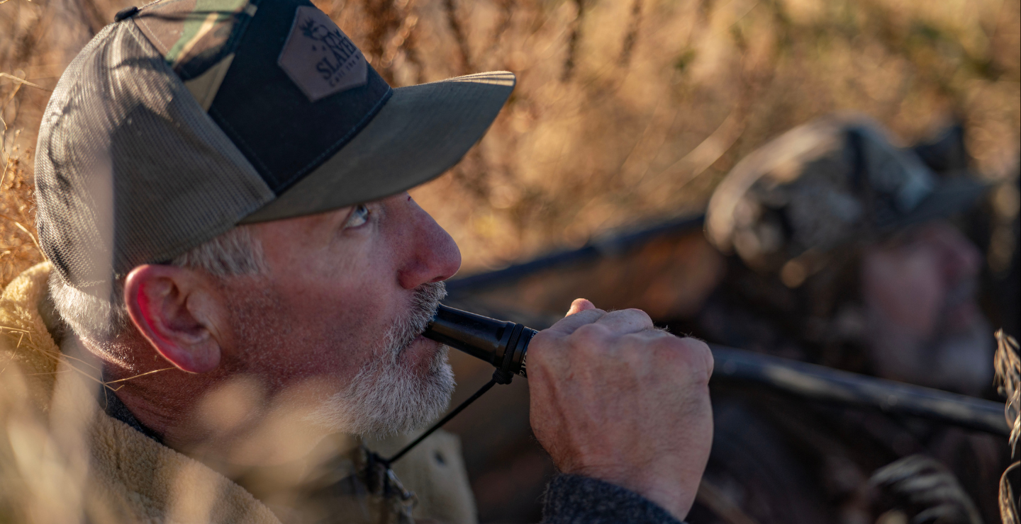 Slayer CEO running the Yolo Bypass duck call in the blind, sitting next to fellow duck hunter.