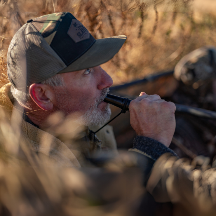 Slayer CEO running the Yolo Bypass duck call in the blind, sitting next to fellow duck hunter.