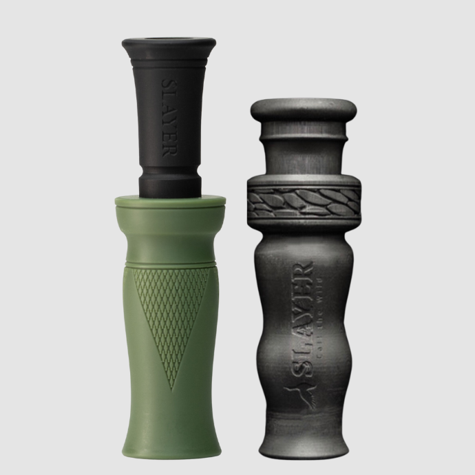 Slayer green and black duck call and a black duck whistle on a light gray background.