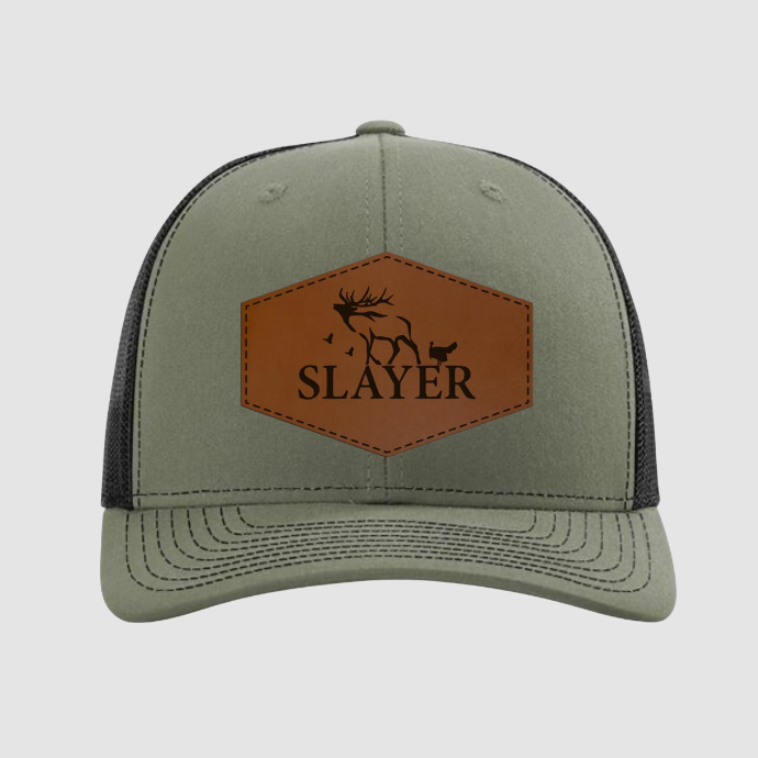 Loden green trucker hat with brown leather patch featuring Slayer logo in black