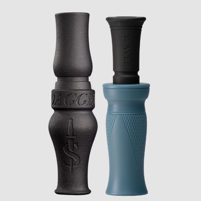 Two waterfowl calls, one black goose call and one blue duck call, on a light gray background.