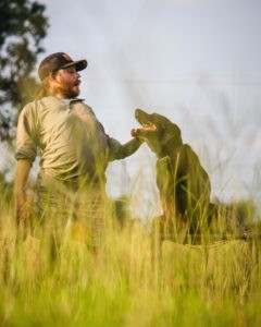 Adaptive Outdoorsman, Hayden Martin with Hunting Labrador Retriever, Hurley