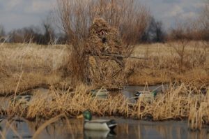Hide with a blind - hunters wearing Avery Ghillie Suit