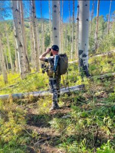 Troubleshooting your elk hunt, hunter glassing the area