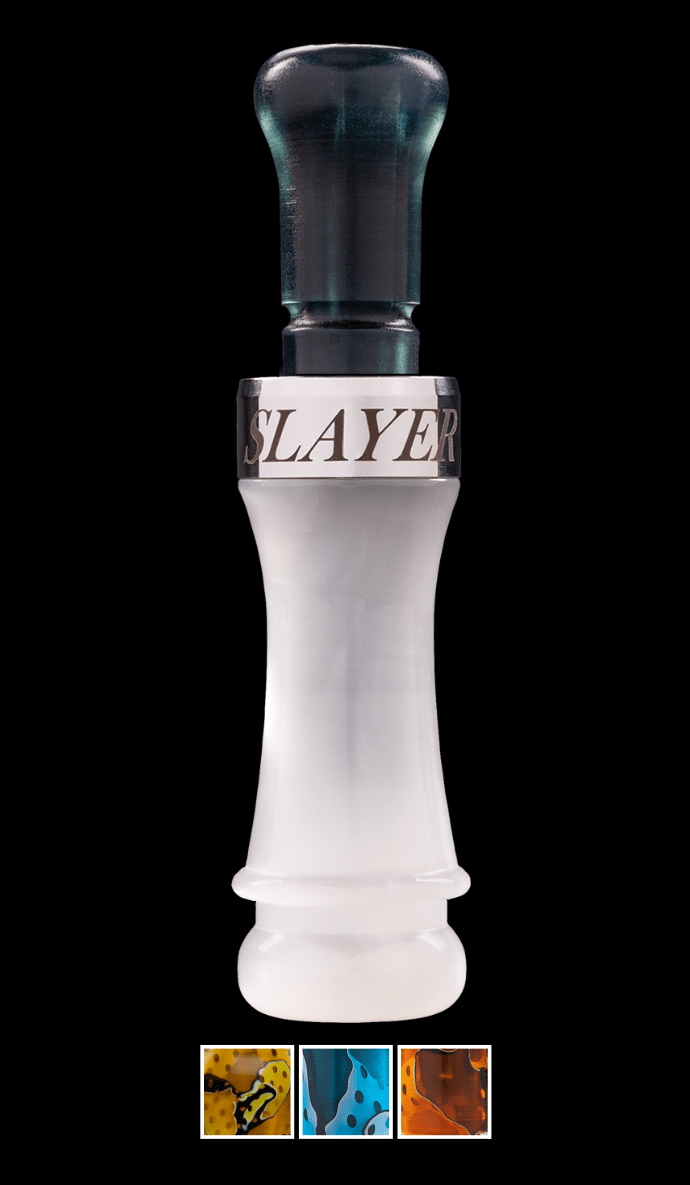 A white acrylic cutdown duck call on a black background.