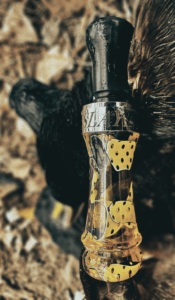 Slayer Cutdown duck call, the Pearly Gates in yellow jacket mesh with leaves in the background